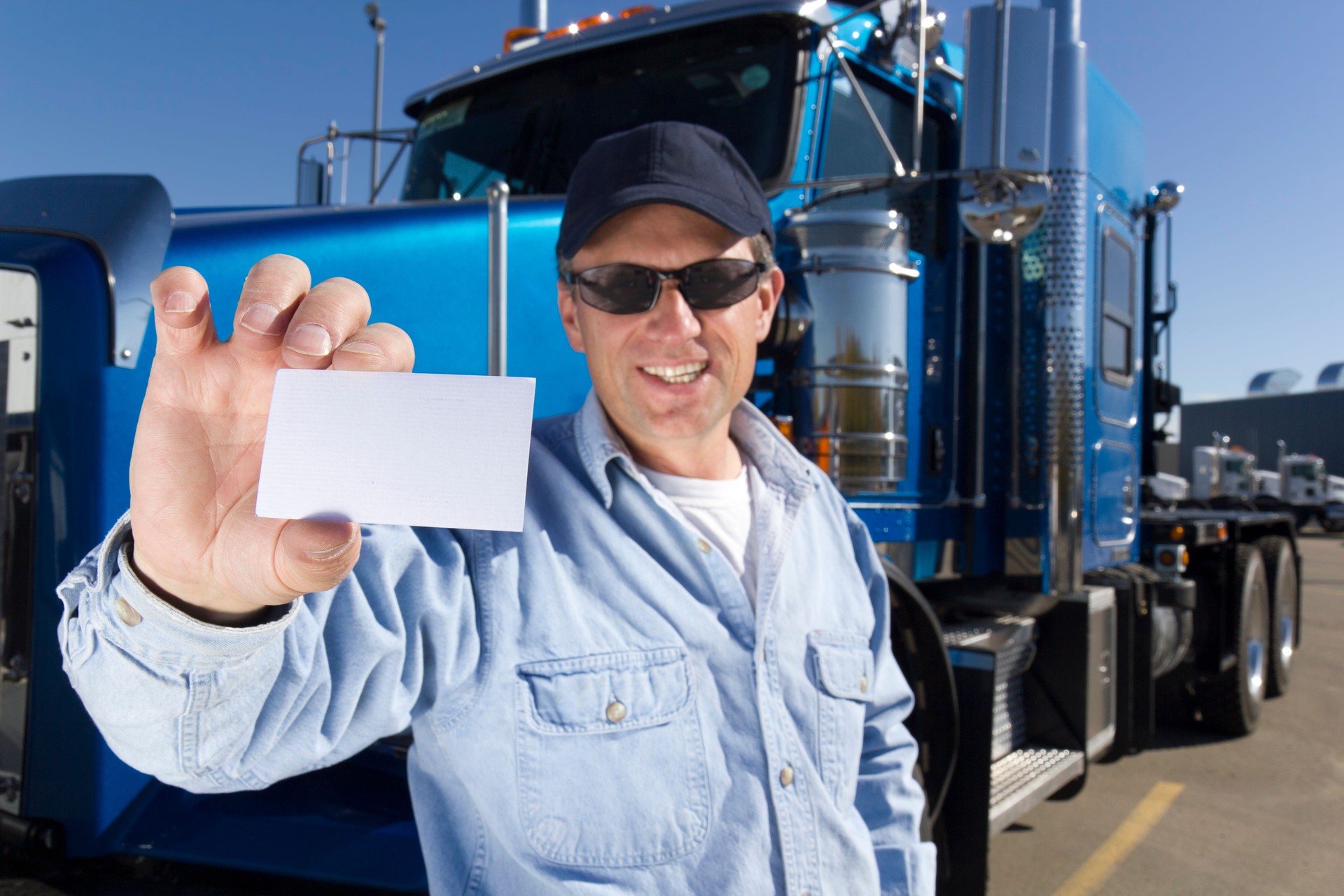 Trucker Holding a Card