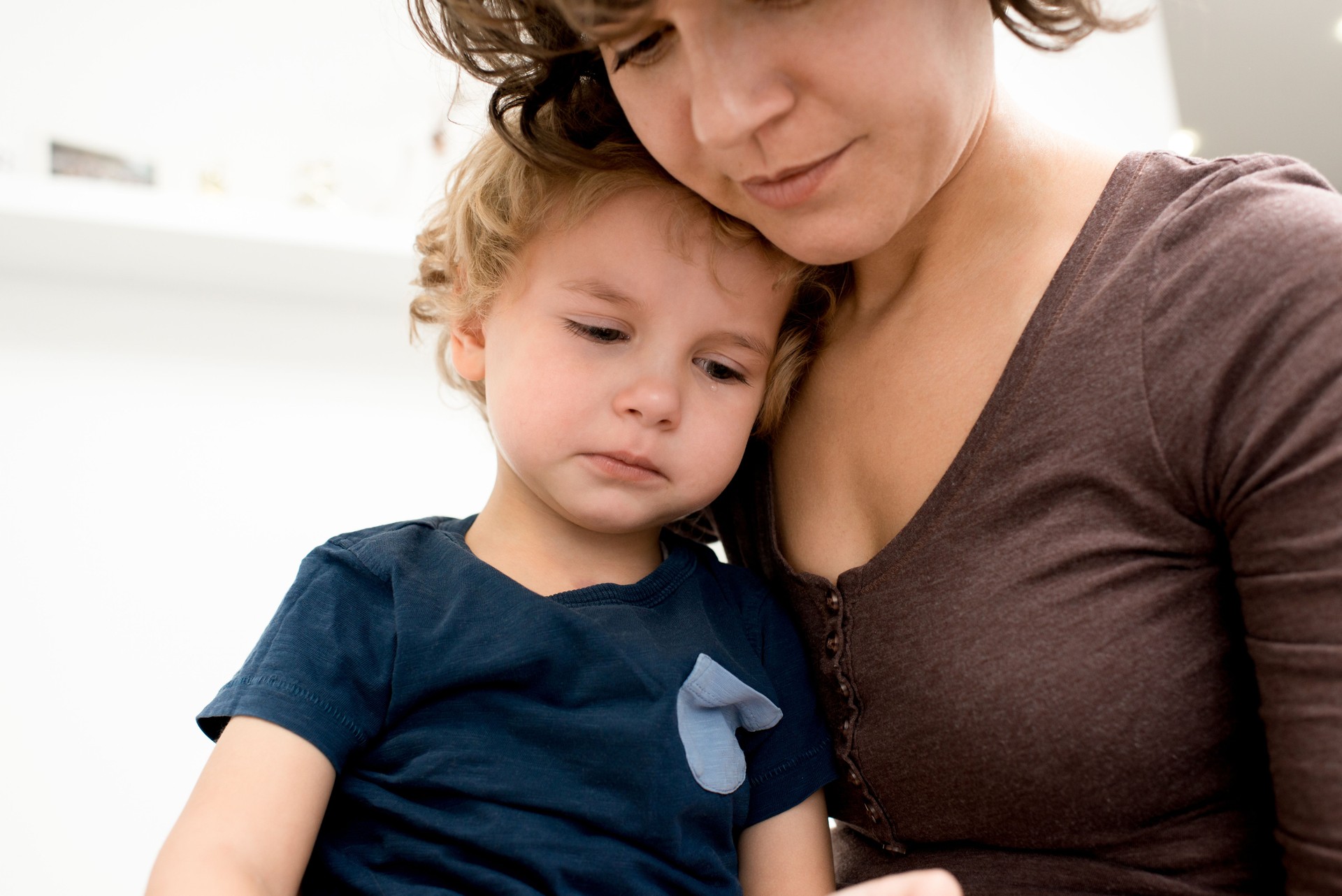 Mother Calming Crying Son